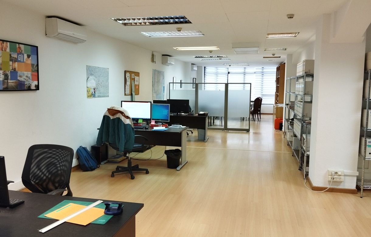 Gabinete pericial compartido | Mesa en Despacho